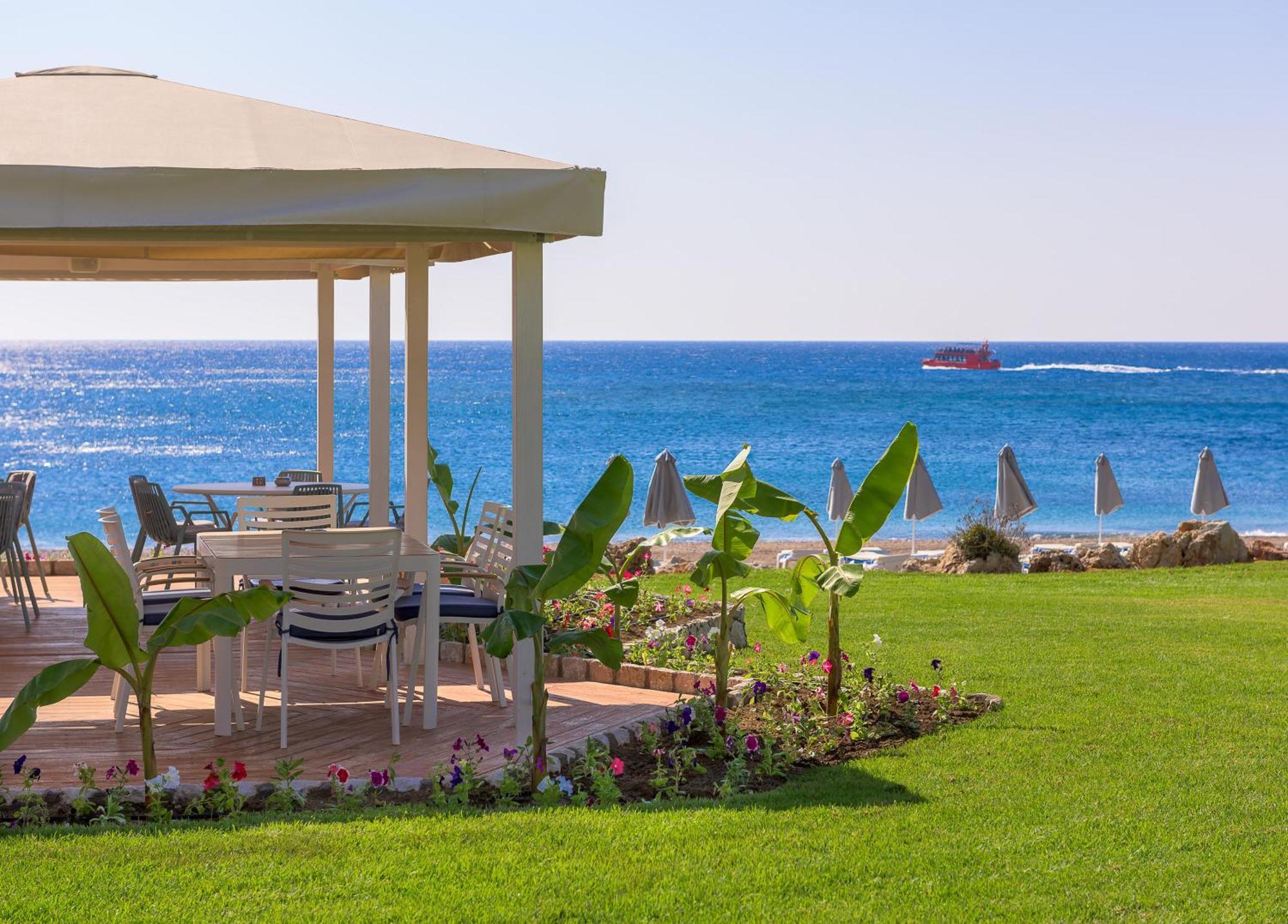 ホテル ロドス パラディウム レジャー ＆ ウェルネス Kallithéa エクステリア 写真 Beach at the Grand Resort
