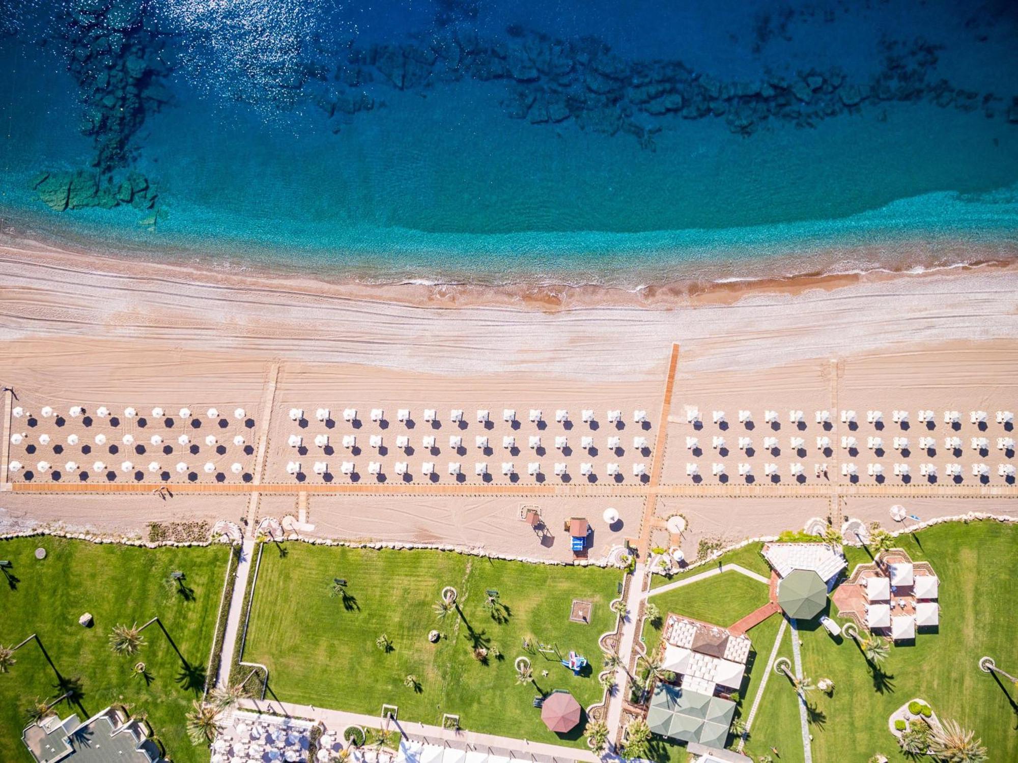 ホテル ロドス パラディウム レジャー ＆ ウェルネス Kallithéa エクステリア 写真 Aerial view of the beach
